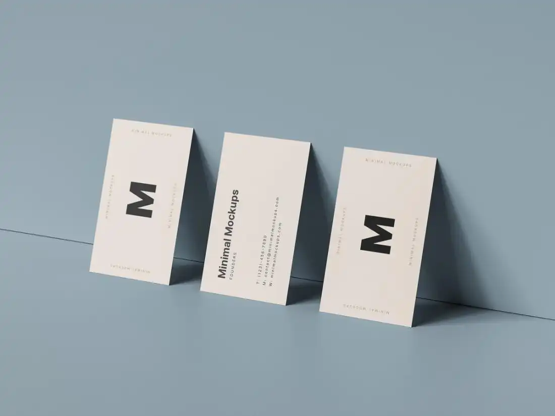 Triple Business Card Against Wall Mockup